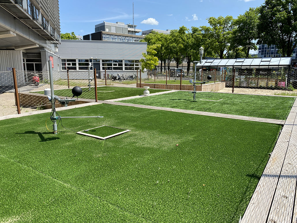 a photo of a field where three types of turf were tested